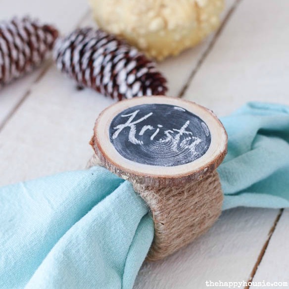 square These simple DIY Twine Chalkboard Wood Slice Napkin Rings act as a placecard at your table and you wont believe they are made with plumbing parts 10