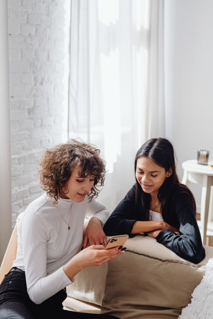 How to Stay Close to Your Teen When They'd Rather Text Than Talk 1 pexels teen mother cell phone